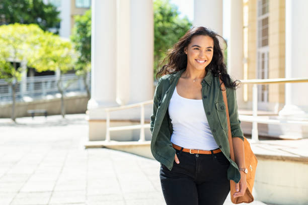 imeless women’s casual wear showing classic black jeans styled with a chic jersey top and flats."