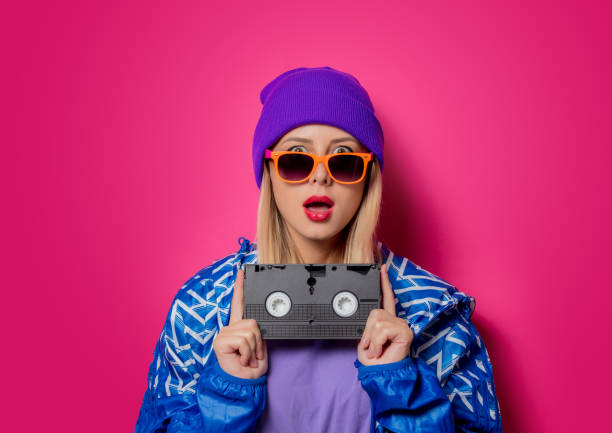 Cast of Heathers dressed in bold preppy looks defining 80s teen trends