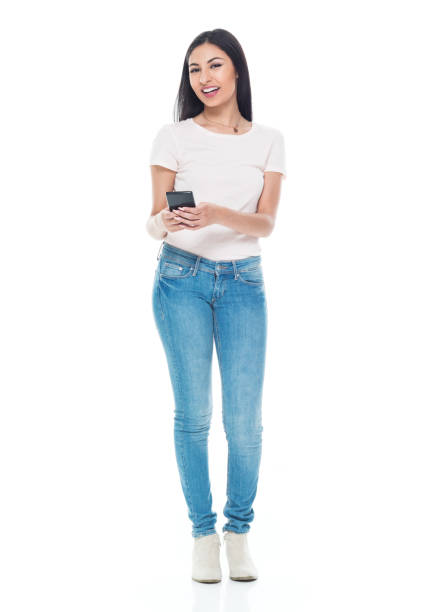Woman wearing stylish ladies casual wear with a white t shirt and white sneakers, perfect for a brunch outin