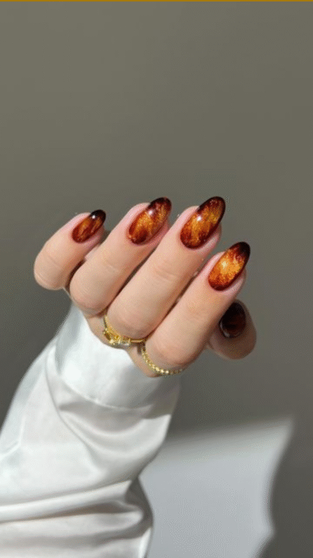 Deep burgundy red nails perfect for fall fashion